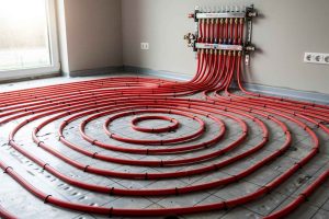 Découvrez comment poser les tuyaux d'un plancher chauffant hydraulique en escargot pour une répartition homogène de la chaleur. Guide pas à pas pour une installation réussie
